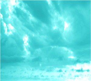 photo of clouds adjusted to a cyan color and used for the background on the Nedtones Vol. 1 CD cover