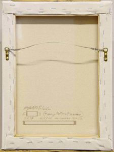 back of canvas showing signature and hanging hardware