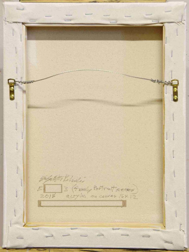 back of canvas showing signature and hanging hardware