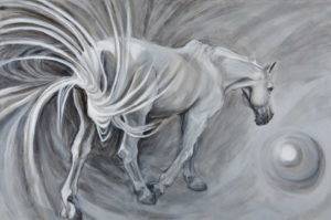 Horse portrait featuring an exaggerated swished tail as the horse walks away toward a mercurial ball. White horse on grey ground.