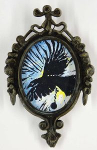snatch (crow series), 2024, water soluble block print ink on paper, variable edition 1/3, at 3 5/8” x 2 7/8” (vintage metal oval frame 5 3/8” x 4”), Elizabeth Lisa Petrulis
